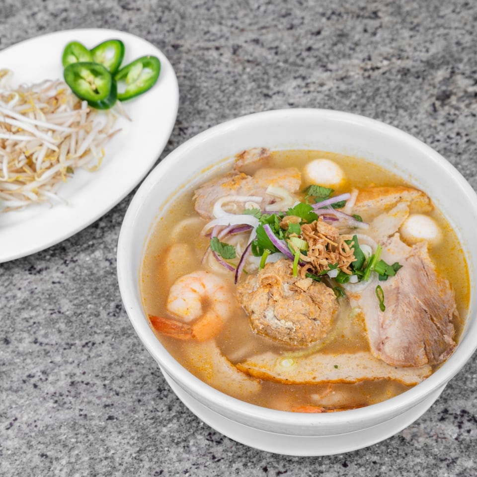 Vo An Vietnamese restaurant's spicy noodle soup with shrimp, pork, and meatballs, served with bean sprouts and jalapeños.